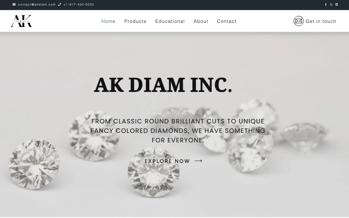 AK Diam homepage with loose diamonds behind the company name
